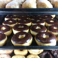 Photo taken at WINCHELL&amp;#39;S DONUT HOUSE by George P. on 10/6/2014