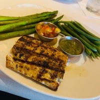 Photo taken at Bonefish Grill by Bella on 5/28/2022