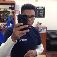 Photo taken at Benny&#39;s Barbershop by Napoleon S. on 11/20/2013