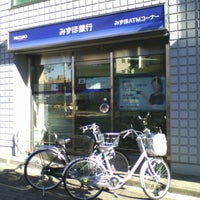 Photo taken at Mizuho Bank ATM by Kunio H. on 12/26/2012
