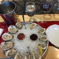 Photo taken at The Grilled Oyster Company by Tara J. on 3/8/2017
