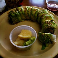Photo taken at Ugly Roll Sushi by Adrian B. on 12/5/2011