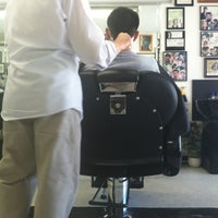 Photo taken at Camille&amp;#39;s Barber &amp;amp; Hair Styling Salon by Bob Y. on 8/4/2012