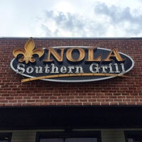 Foto diambil di Nola Southern Grill oleh Susan W. pada 7/20/2015