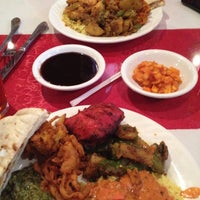Photo taken at Tandoor Fine Indian Cuisine by John N. on 12/13/2012