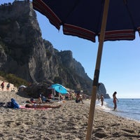 Photo taken at Spiaggia del Malpasso by Olga S. on 7/19/2016