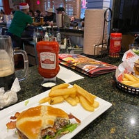 Photo taken at Red Robin Gourmet Burgers and Brews by Dylan W. on 12/7/2019