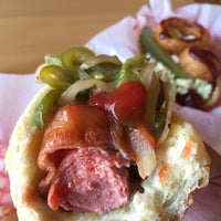 Photo taken at The Slaw Dogs at the Village by Mel on 3/21/2015