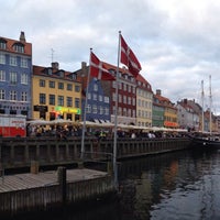 Photo taken at Nyhavn by Vineet S. on 8/16/2014