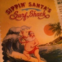 Photo taken at Sippin&amp;#39; Santa&amp;#39;s Surf Shack by K on 1/11/2016