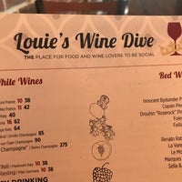 Photo taken at Louie&amp;#39;s Wine Dive &amp;amp; Ripple Kitchen by Staci C. on 7/25/2018