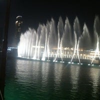 Photo taken at The Dubai Fountain by Red F. on 5/9/2013