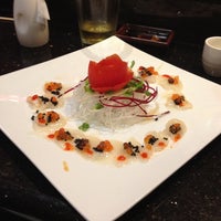 Photo taken at Sun Sushi Bar &amp;amp; Japanese Cuisine by Mark V. on 5/11/2013