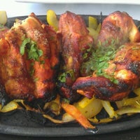 Снимок сделан в Clay Oven Indian Restaurant пользователем Ksenia J. 12/26/2012