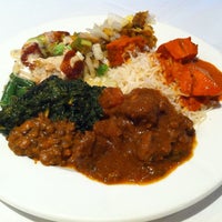 Photo taken at Saffron Indian Cuisine by Mark C. on 12/24/2012