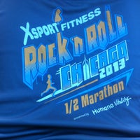 Photo taken at 2013 XSport Fitness Rock n Roll Half Marathon Expo by Mary Ann K. on 7/20/2013