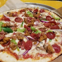 Photo taken at Pieology Pizzeria by Mark O. on 11/18/2017