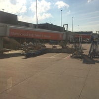 Photo taken at Gate D55 by Tim D. on 4/12/2016