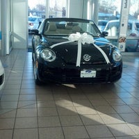 Photo taken at McDonald Volkswagen by Melina G. on 12/11/2012