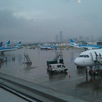 Photo taken at Gate 12 by Jep T. on 4/1/2013