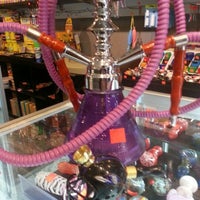 Photo taken at Dragon&amp;#39;s Den Smoke Shop by Andres O. on 1/28/2013