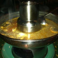 Photo taken at Wild Thai Restaurant by Murphy P. on 3/17/2013