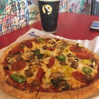 Photo taken at Hot Toppings Pizza by Aaron on 5/8/2017