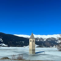 Photo taken at Reschensee / Lago di Resia by Dorine P. on 3/5/2022