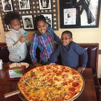 Foto diambil di Pazzo Big Slice Pizza oleh Judge C. pada 1/16/2017