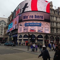 Photo taken at Piccadilly Circus by Alexander P. on 5/11/2013
