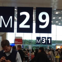 Photo taken at Gate M29 by Marc M. on 10/8/2012
