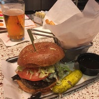 Photo taken at Burgers and More by Emeril by James M. on 6/1/2019