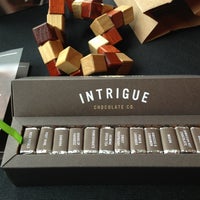 Photo taken at Intrigue Chocolates Co. by Jeff P. on 2/9/2013