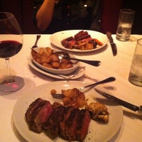 Photo taken at Fleming&#39;s Prime Steakhouse &amp; Wine Bar by Drew M. on 10/18/2014