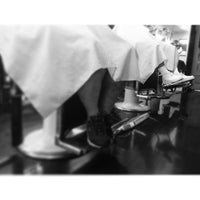 Photo taken at Jake&amp;#39;s Barber Shop by Rudy E. on 7/12/2013