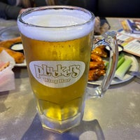 Photo taken at Pluckers Wing Bar by David H. on 11/28/2021
