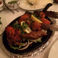 Photo taken at Asha Indian Restaurant by Trae H. on 12/5/2013