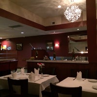 Photo taken at Asha Indian Restaurant by Trae H. on 12/4/2013