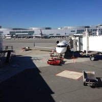 Photo taken at Gate 34 by Ian F. on 11/4/2012