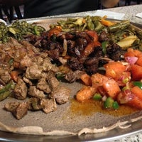 Photo taken at Kokeb Ethiopian Restaurant by Simon H. on 8/21/2013