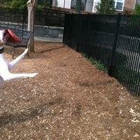 Photo taken at Atlantic Station Dog Park by Katie W. on 10/7/2012