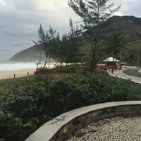 Photo taken at Praia da Macumba by Claudia R. on 5/24/2016