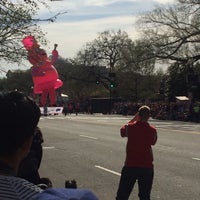 Photo taken at Cherry Blossom Parade by Amy W. on 4/12/2014