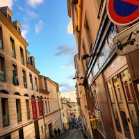 Photo taken at Rue des Abbesses by Joel G. on 10/4/2016