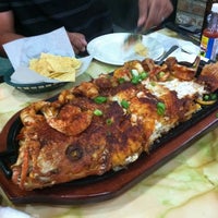 Photo taken at Ostioneria Michoacana Seafood &amp; Oyster Bar by Jennifer on 12/9/2012
