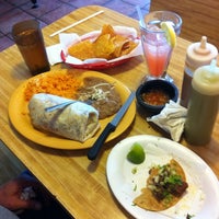 Photo taken at Gracie&amp;#39;s Lucky Burrito II by Erick G. on 9/16/2012