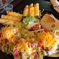 Photo taken at Taco Shop Mexican Grill by Adriana M. on 7/21/2014