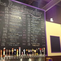 Photo taken at The Beer Growler by km q. on 10/6/2012