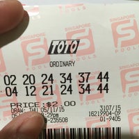 Photo taken at Singapore Pools @ Lucky Plaza by Lora G. on 11/5/2015