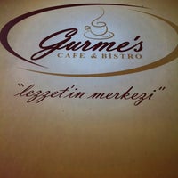 Photo taken at Gurme&amp;#39;s Cafe &amp;amp; Bistro by Fatih A. on 7/17/2013